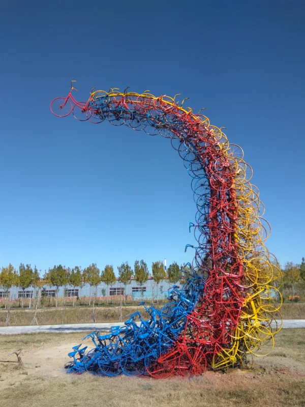 Tower of Babel, 2017, bicycle installation, height 700 cm, large-scale installation made of stacked bicycles symbolizing communication and chaos