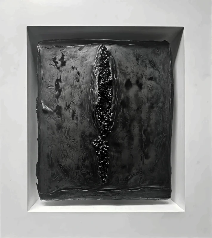 Zhu Qing, Reconstruction No.42, mixed media relief, 2024, wall sculpture, black compressed surface with central vertical rupture and dense material accumulation, exploring tension and material pressure