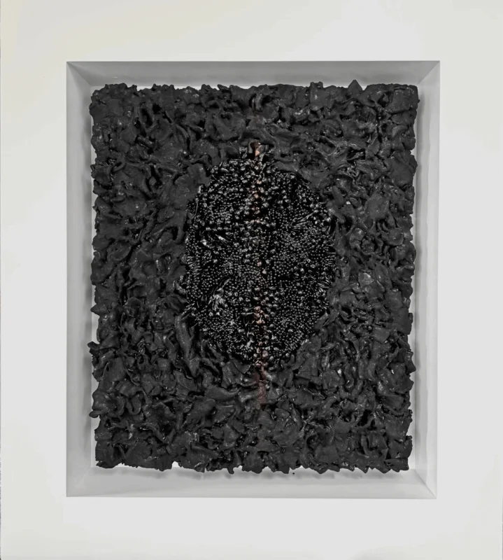 Zhu Qing, Reconstruction No.57, mixed media relief, 2025, black high-density folded surface with granular accumulation at the center, forming a concentrated structural core