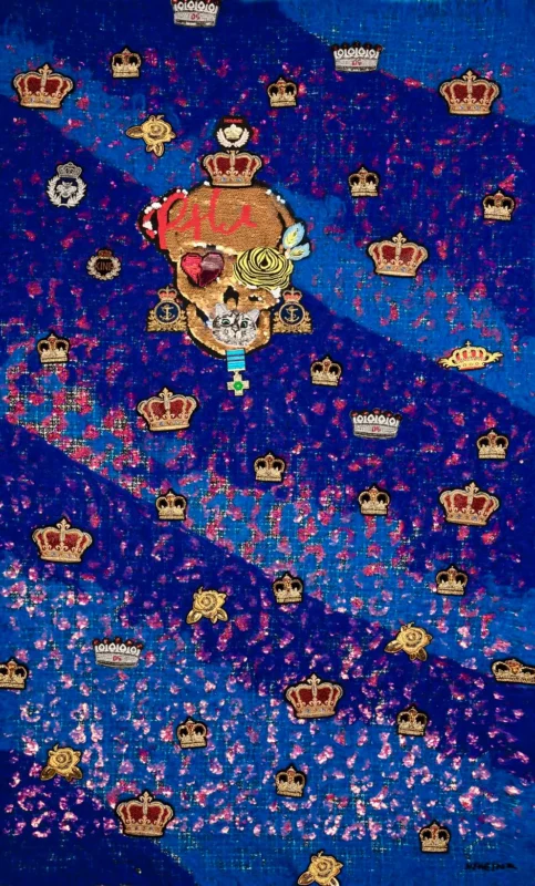 Mixed-media artwork featuring a crowned skull motif surrounded by repeated crown symbols on a vivid blue background.