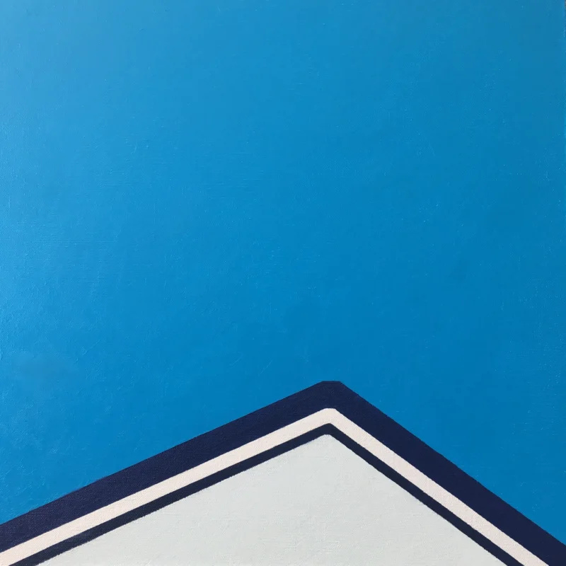Minimal geometric roofline set against a clear blue sky, reducing architecture to pure shape and color.