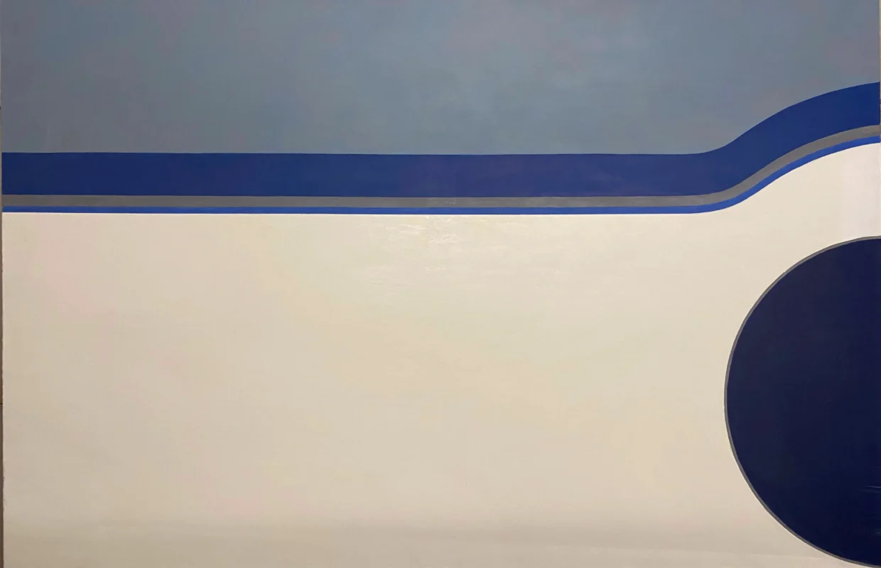 A minimalist composition featuring a curved blue architectural line and a large circular form against a pale wall, reducing architectural details to geometric relationships.