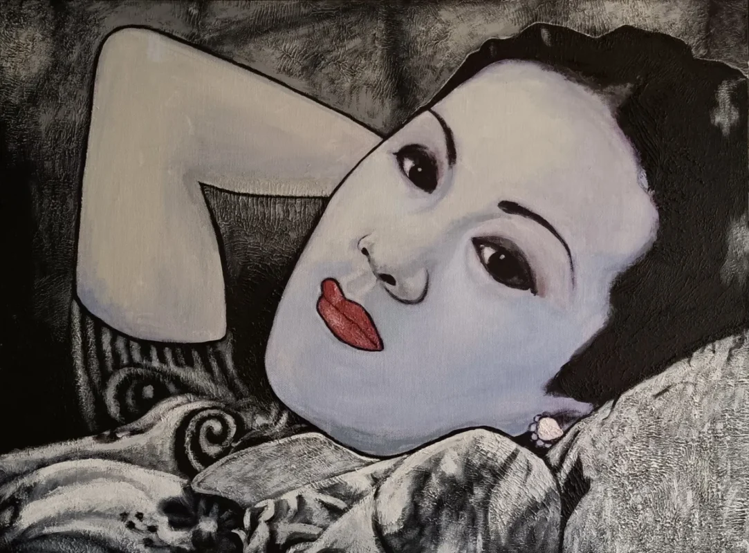 A close-up portrait of Chinese actress Shangguan Yunzhu reclining with her head resting on one arm.
