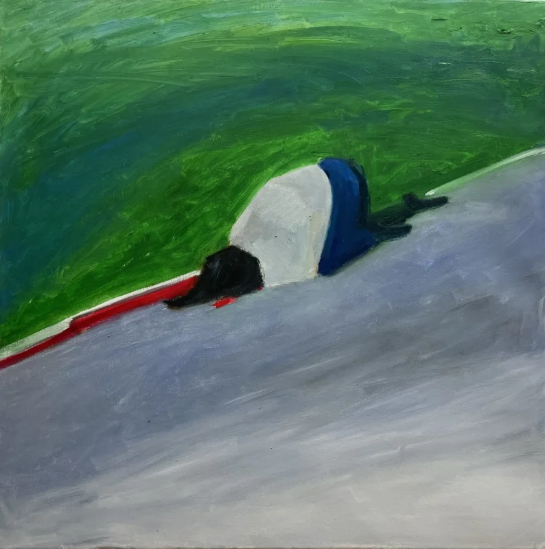 A fallen figure lying on a green hillside