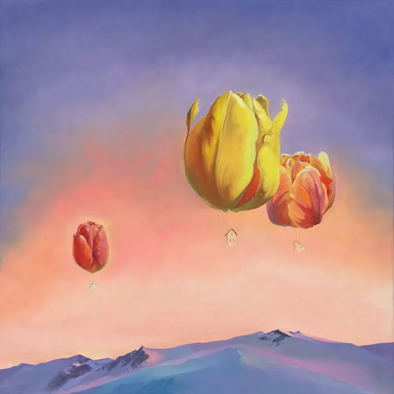 Three floating tulip-like blossoms drift through a pastel sky like hot-air balloons above distant mountain ranges.